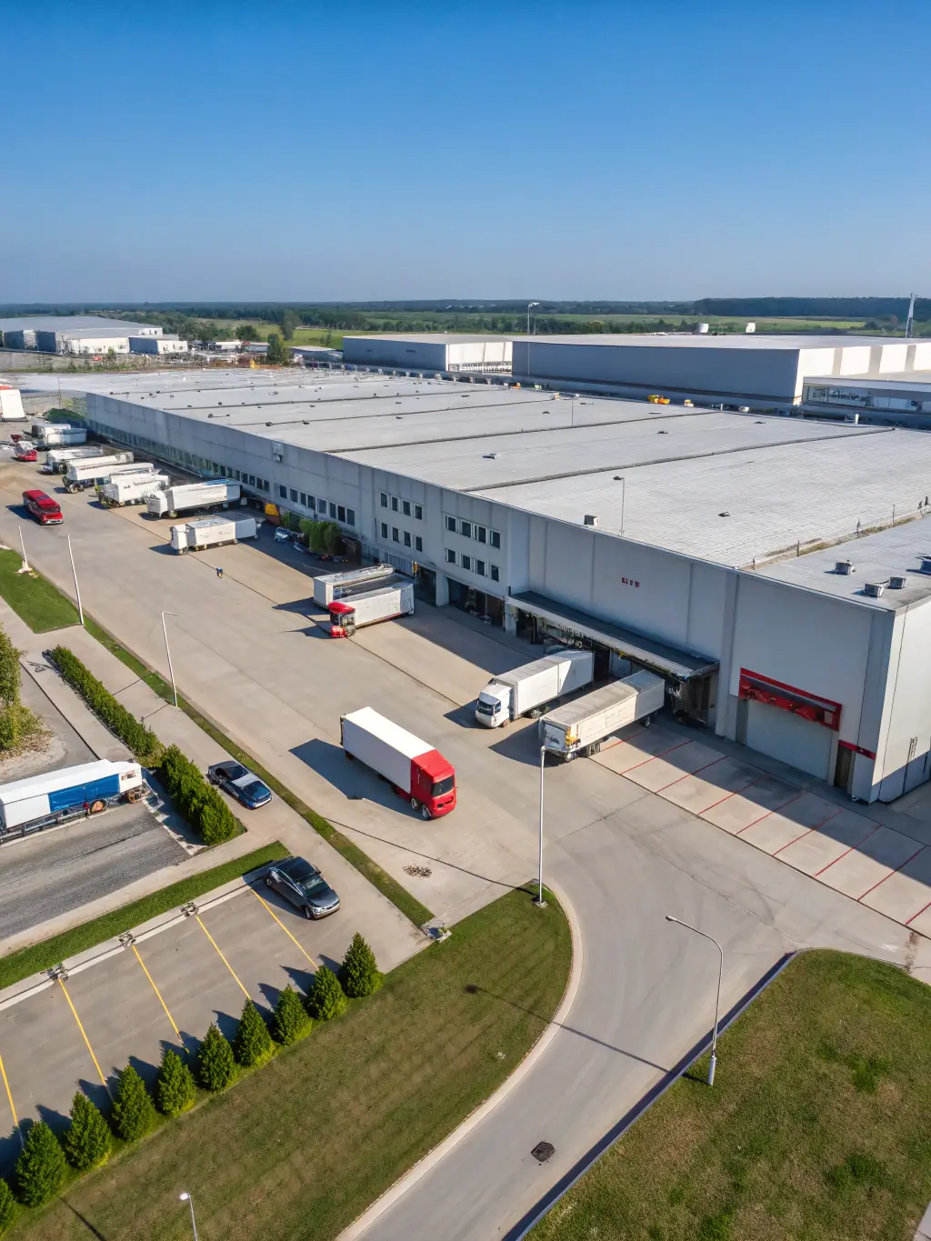 A large, open warehouse space with multiple loading docks and easy access to major highways, ideal for logistics and distribution businesses in the Dallas area.